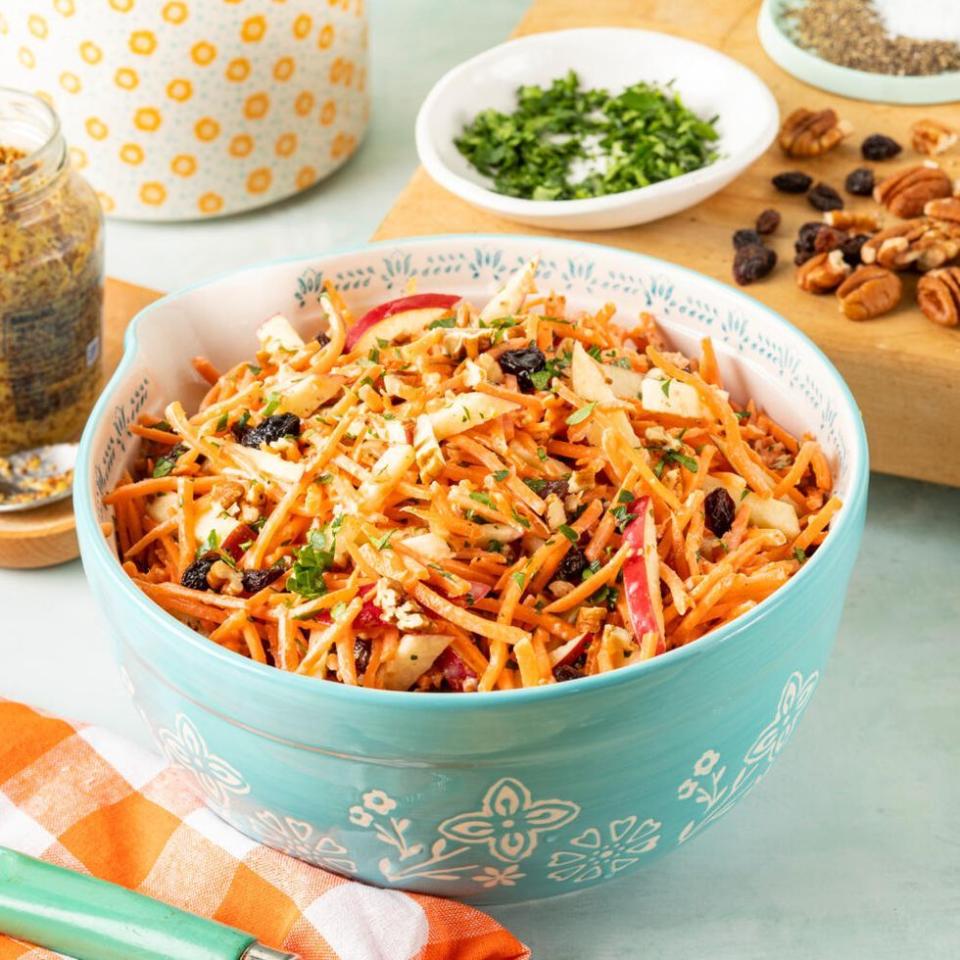 carrot salad in light blue bowl