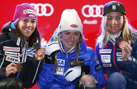 Alpine Skiing - FIS Alpine Skiing World Championships - Women's Slalom - St. Moritz, Switzerland - 18/2/17 - Wendy Holdener of Switzerland, Mikaela Shiffrin of the USA and Frida Hansdotter of Sweden poses with their medals. REUTERS/Ruben Sprich