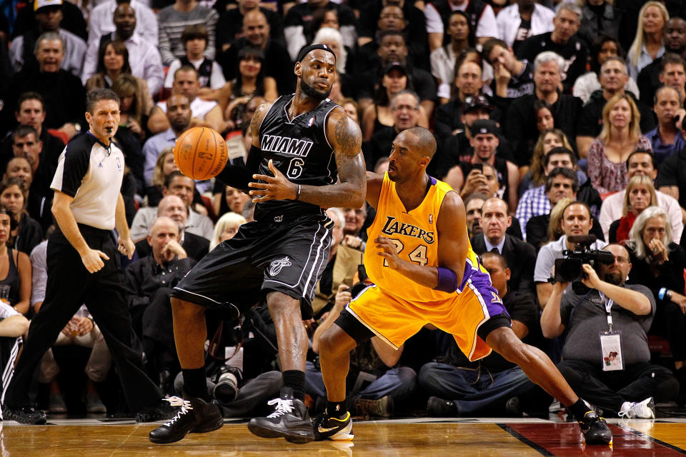 MIAMI, FL - JANUARY 19: LeBron James #6 of the Miami Heat is guarded by Kobe Bryant #24 of the Los Angeles Lakers during a game at American Airlines Arena on January 19, 2012 in Miami, Florida. NOTE TO USER: User expressly acknowledges and agrees that, by downloading and/or using this Photograph, User is consenting to the terms and conditions of the Getty Images License Agreement. (Photo by Mike Ehrmann/Getty Images)