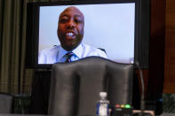 Sen. Tim Scott, R-S.C., speaks via teleconference during a Senate Finance Committee hearing to examine the expected nomination of Janet Yellen to be Secretary of the Treasury on Capitol Hill in Washington, Tuesday, Jan. 19, 2021. (AP Photo/Andrew Harnik, Pool)