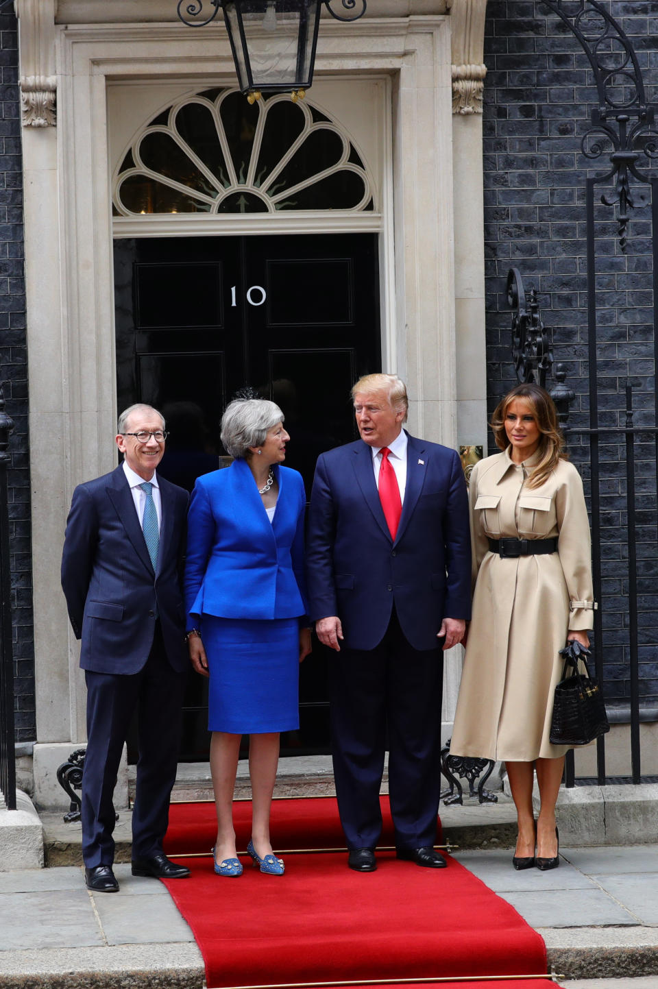 (left to right) Philip May and Prime Minister Theresa May welcoming US President Donald Trump and first lady Melania Trump to Downing Street, London, on the second day of his state visit to the UK.