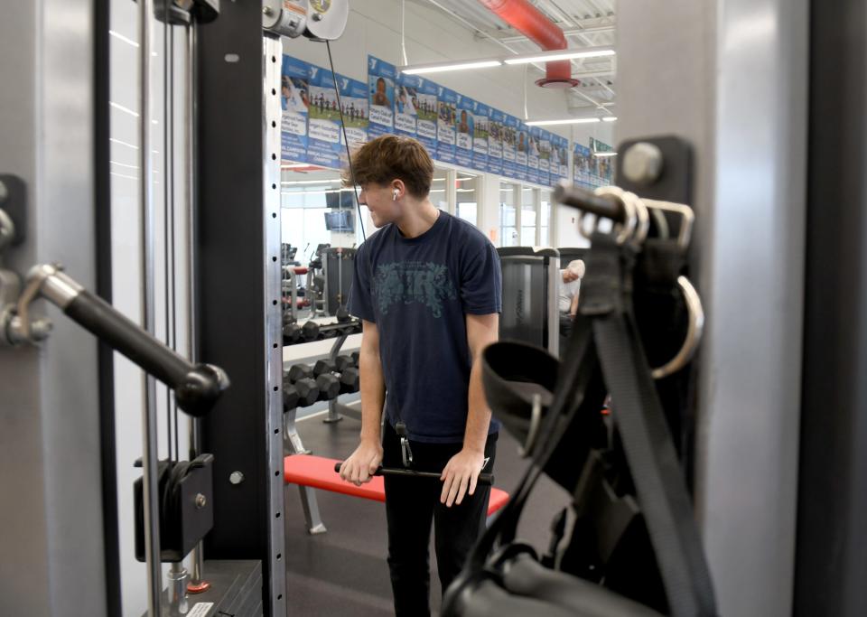 Brayden Adreff, 18, spends time in the fitness room at Schalmo Family YMCA in Canal Fulton.