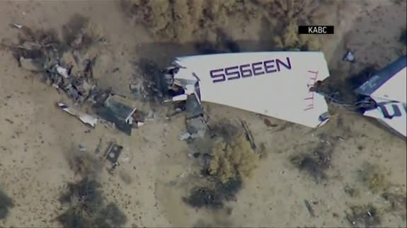 Pieces of of Virgin Galactic's SpaceShipTwo space plane are seen on the Mojave Desert floor after a deadly crash that killed one pilot and injured another on Oct. 31, 2014. The crash occurred during a rocket-powered test flight.