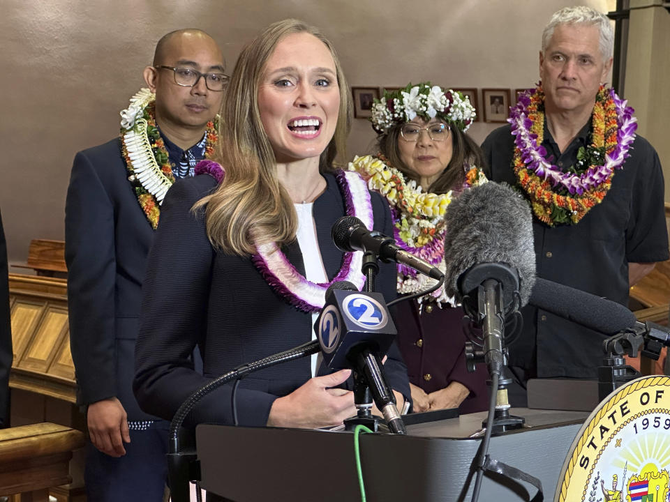 State Rep. Lauren Matsumoto, the House minority leader, speaks to reporters at the Hawaii State Capitol, the last day of the legislative session, Friday, May 3, 2024 in Honolulu. Hawaii lawmakers on Friday wrapped up a legislative session heavily focused on addressing Maui's needs after last year's deadly Lahaina wildfire. (AP Photo/Audrey McAvoy)