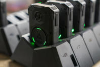 Axon body cameras charge on a docking station at Oklahoma City police headquarters on Friday, May 31, 2024 in Oklahoma City, Oklahoma. (AP Photo/Nick Oxford)