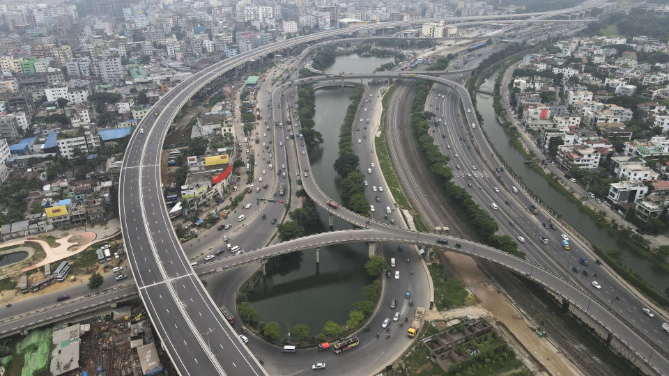 An aerial view of roads and flyovers in Dhaka, Bangladesh, Aug. 29, 2023. For decades, political battles in Bangladesh have been fought on the streets, often with violence, by parties led by two powerful women. But there are signs of a generational change as the country of 169 million heads into another general election Sunday. A burgeoning technology industry, lively e-commerce and growing public digital infrastructure are helping one of South Asia’s fastest growing economies capitalize on a tech-savvy workforce which is demanding change from politicians. (AP Photo/Mahmud Hossain Opu)