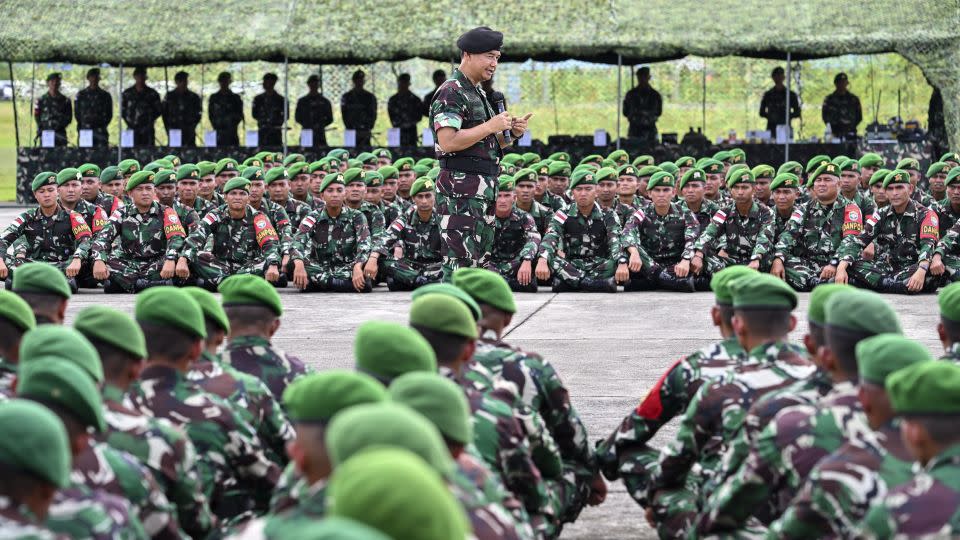 Indonesian soldiers at the Sultan Iskandar Muda Airforce base in Aceh province are briefed before being deployed to West Papua for security operations. - Chaideer Mahyuddin/AFP/Getty Images