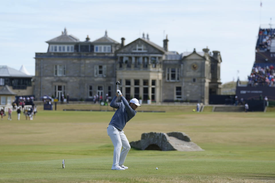 Scottie Scheffler of the US plays from the 18th tee during the second round of the British Open golf championship on the Old Course at St. Andrews, Scotland, Friday July 15, 2022. The Open Championship returns to the home of golf on July 14-17, 2022, to celebrate the 150th edition of the sport's oldest championship, which dates to 1860 and was first played at St. Andrews in 1873. (AP Photo/Alastair Grant)