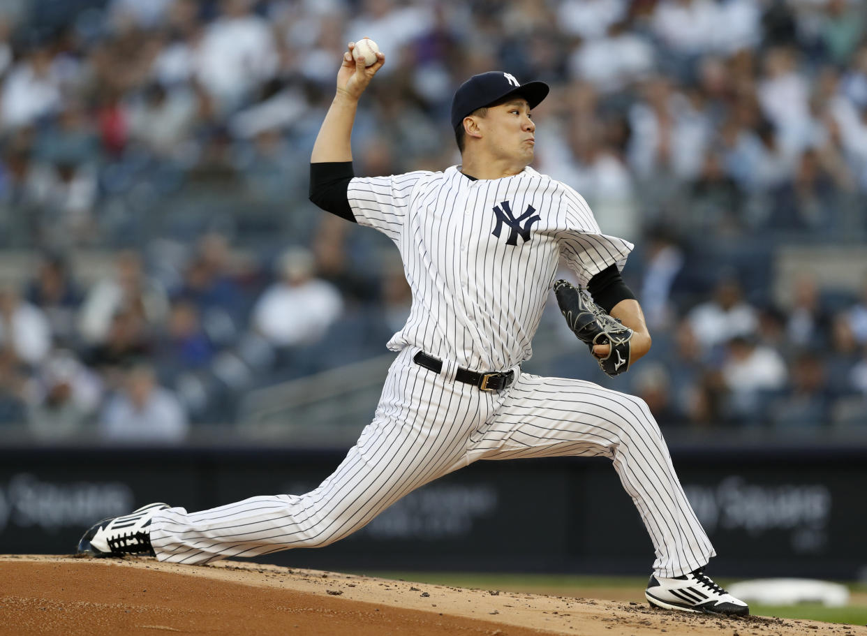 New York Yankees starting pitcher Masahiro Tanaka is a buy-low opportunity in fantasy leagues. (AP Photo/Kathy Willens)