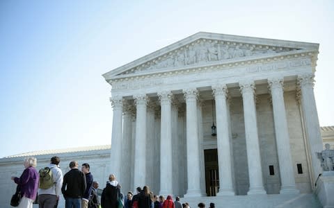 The US Supreme Court is currently sitting without a ninth justice - Credit: AFP