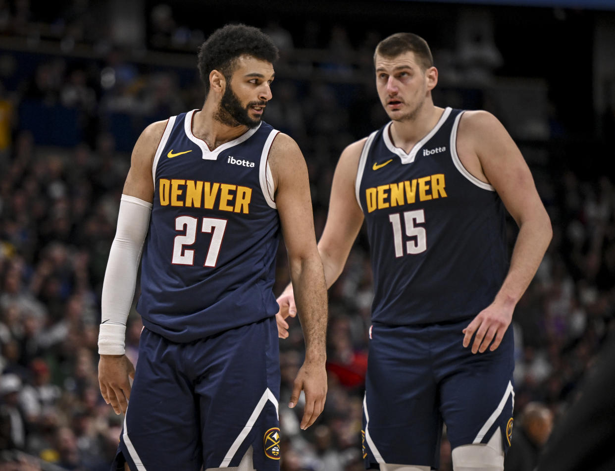 DENVER, CO - JANUARY 29: Jamal Murray (27) and Nikola Jokic (15) of the Denver Nuggets work against the Milwaukee Bucks during the fourth quarter of the Nuggets' 113-107 win at Ball Arena in Denver on Monday, January 29, 2024. (Photo by AAron Ontiveroz/The Denver Post) Milwaukee