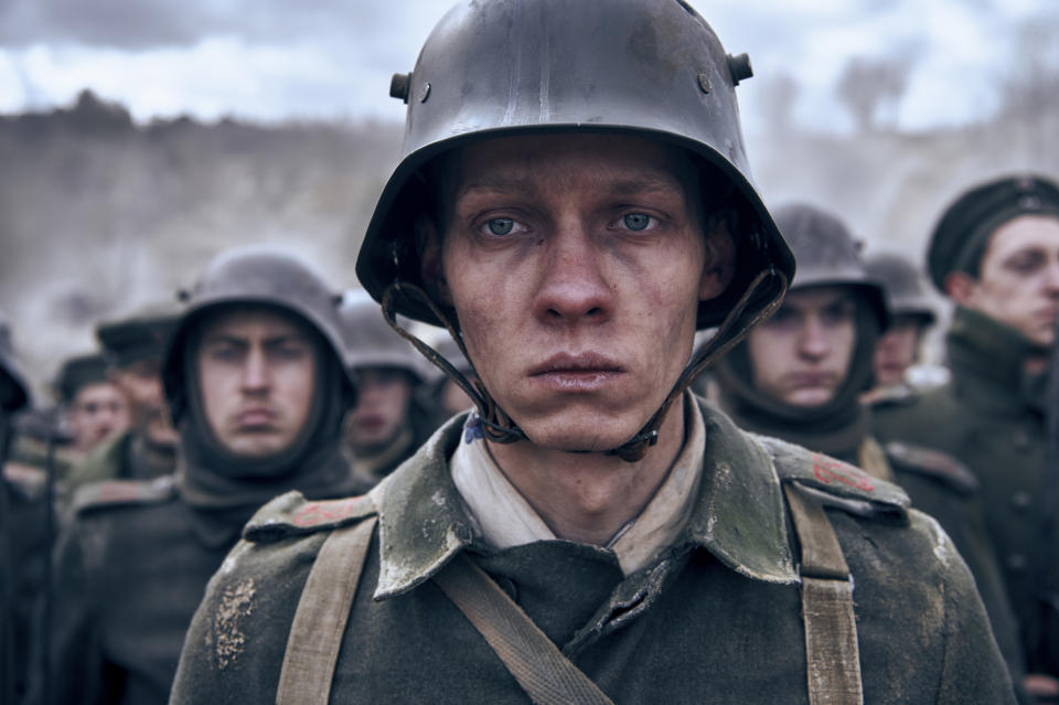 This image provided by Netflix shows Felix Kammerer in a scene from "All Quiet on the Western Front." (Reiner Bajo/Netflix via AP)