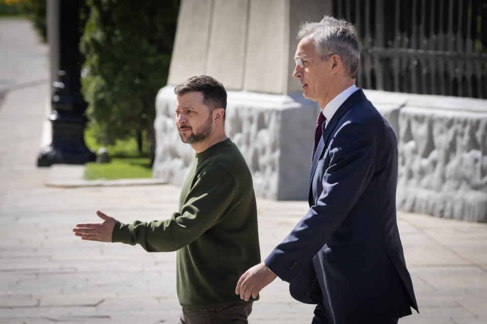 Ukrainian President Volodymyr Zelenskyy, left, welcomes NATO Secretary General Jens Stoltenberg walk before their press conference in Kyiv Ukraine, Monday, April 29, 2024. (AP Photo/Efrem Lukatsky)