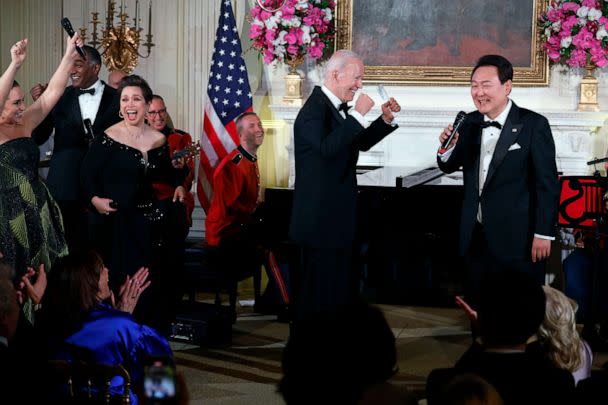 PHOTO: President Joe Biden cheers as South Korean President Yoon Suk-yeol sings 'American Pie' by Don McLean during a state dinner at the White House, April 26, 2023. (Chip Somodevilla/Getty Images)