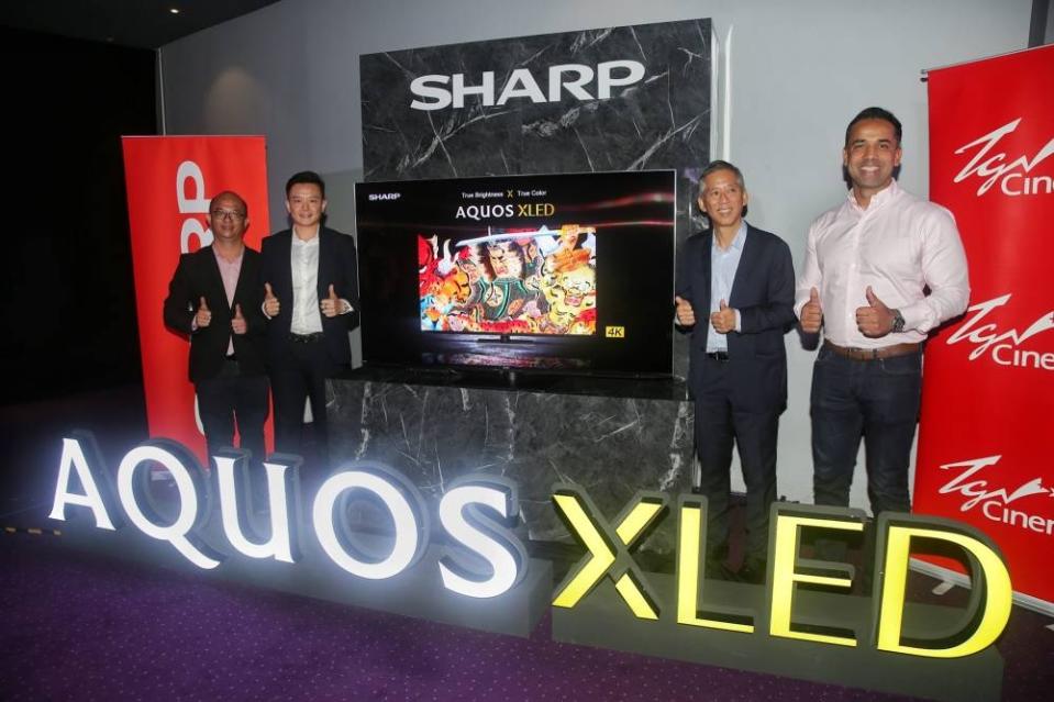 Sharp Electronics Malaysia general manager Jacky Heng, managing director Ting Yang Chung, TGV Cinemas chief executive officer Tan Lay Han and chief marketing officer Mohit Bhargava unveil Sharp Aquos XLED TV. — Picture by Choo Choy May 