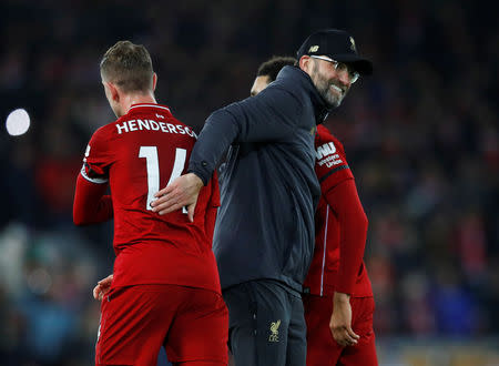 Soccer Football - Premier League - Liverpool v Arsenal - Anfield, Liverpool, Britain - December 29, 2018 Liverpool manager Juergen Klopp celebrates with Jordan Henderson at the end of the match REUTERS/Phil Noble