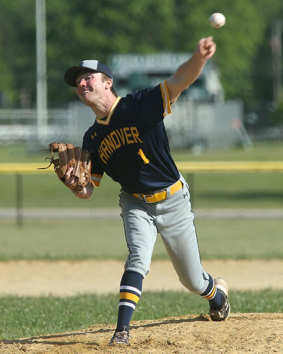 Hanover's Evan Hebblethwaite delivers to a Marshfield batter in the bottom of the third inning of a game at Marshfield High School on Thursday, May 26, 2022.