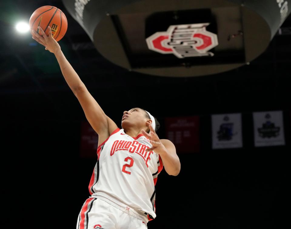 Feb. 25, 2024; Columbus, Ohio, USA; 
Ohio State Buckeyes guard Taylor Thierry (2) makes a layup during the third quarter of an NCAA Division I basketball game against the Maryland Terrapins at Value City Arena on Sunday. Ohio State won the game 79-66.