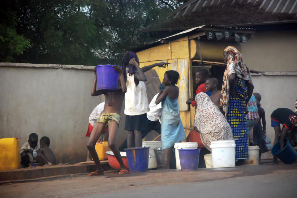Lagos residents buying water. Activists, unions, community leaders and members of the public have thus far been successful in resisting the introduction of public-private partnerships to the city's water sector.&nbsp; (Photo: ERA/FoEN)