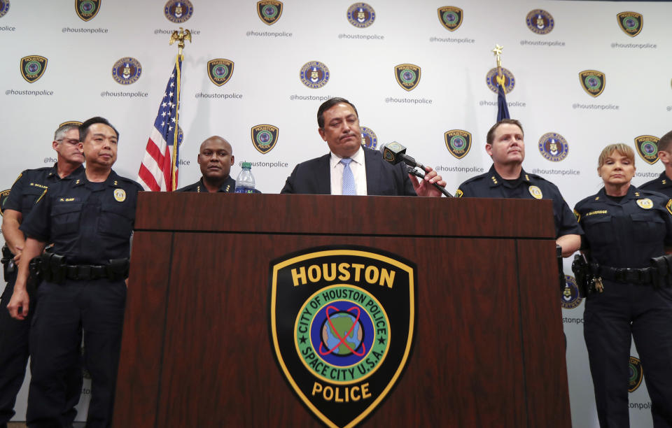 Houston Police Chief Art Acevedo address charges against two police officers in the fatal drug raid, Friday, Aug. 23, 2019, in Houston. A former Houston police officer has been charged with murder in connection with the deadly January drug raid of a home that killed a couple who lived there and injured five officers, prosecutors announced Friday. (Steve Gonzales/Houston Chronicle via AP)