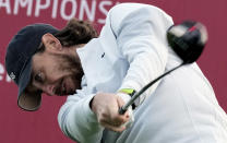 Tommy Fleetwood of England tees off on the 11th hole during the second round of the Abu Dhabi Championship golf tournament at the Yas Links Golf Course, in Abu Dhabi, United Arab Emirates, Friday, Jan. 21, 2022. (AP Photo/Kamran Jebreili)