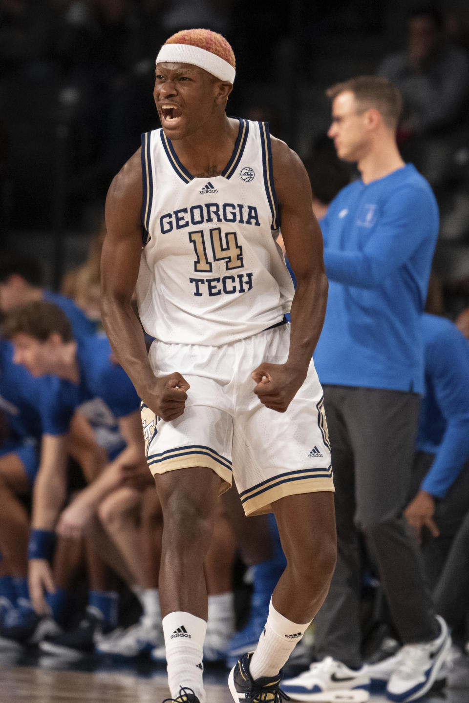 Georgia Tech guard Kowacie Reeves Jr. (14) reacts after making a 3-pointer in the first half of an NCAA college basketball game against Duke, Saturday, Dec. 2, 2023, in Atlanta. (AP Photo/Hakim Wright Sr.)