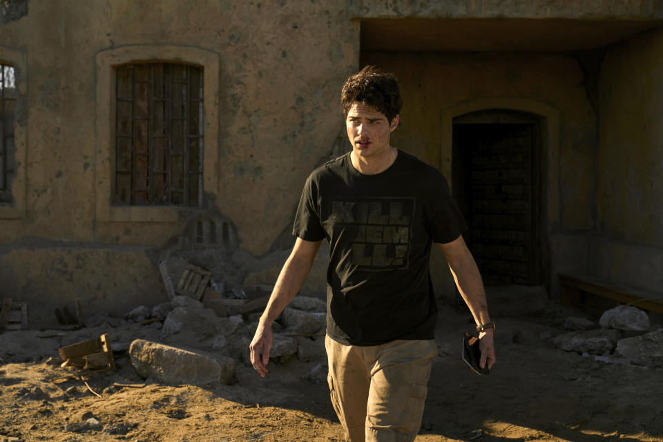 This image released by Netflix shows Noah Centineo as Owen Hendricks in a scene from the series "The Recruit." (Philippe Bossé/Netflix via AP)
