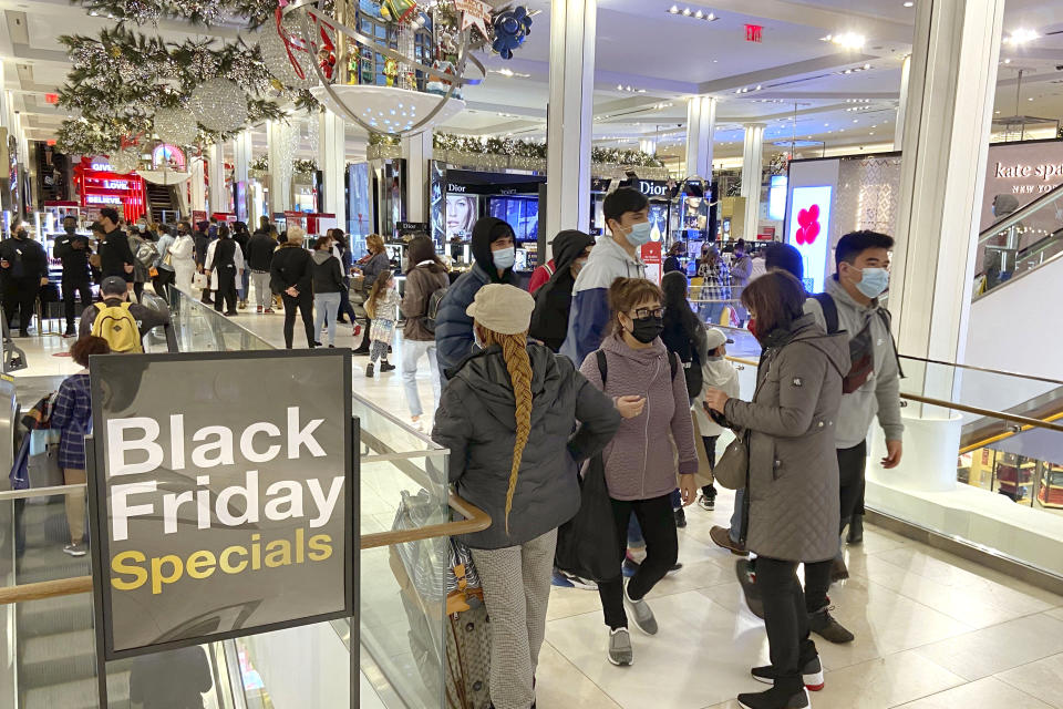 Holiday shopping at Macy’s. - Credit: Kyodo via AP Images