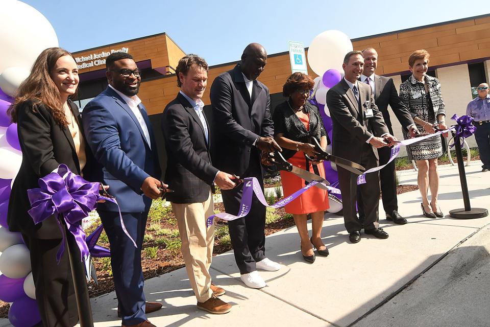 Michael Jordan and his mother Deloris Jordan take part in a ribbon cutting ceremony outside of The Michael Jordan Family Medical Clinic led by Novant Health off of Greenfield Street Tuesday May 7, 2024 in Wilmington, N.C. KEN BLEVINS/STARNEWS