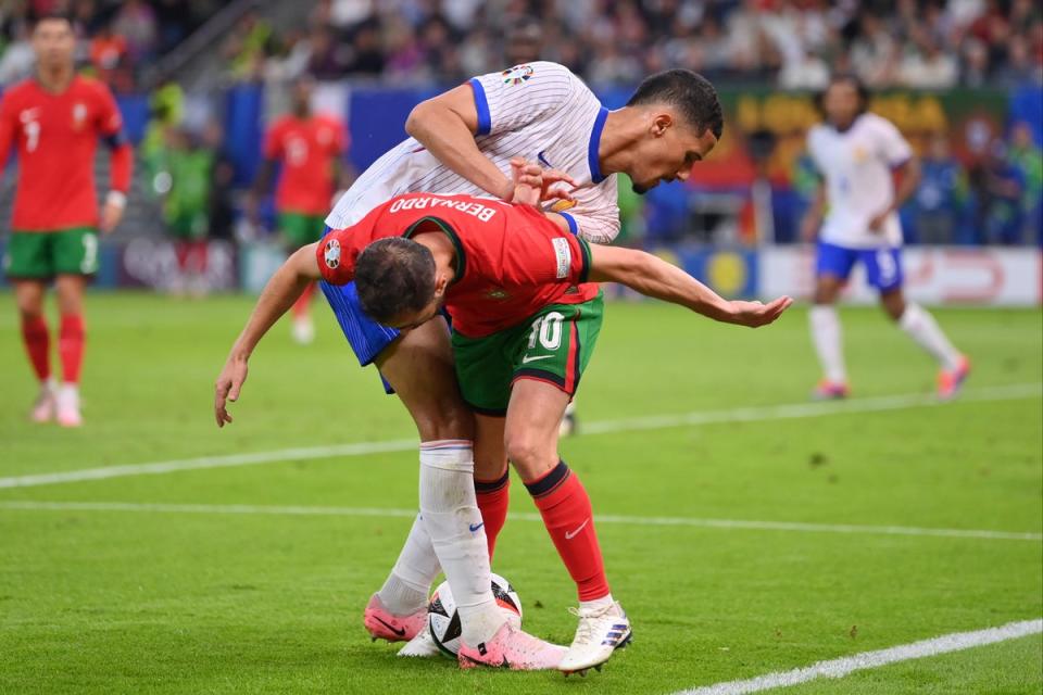 William Saliba and Bernardo Silva battle for the ball (Getty Images)