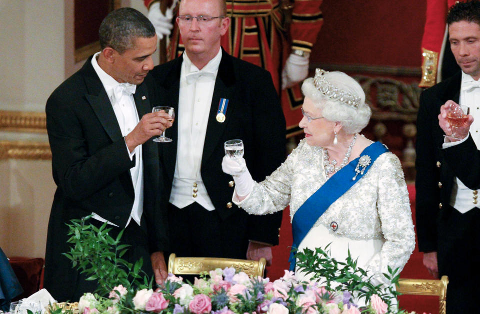 FILE - In this May 24, 2011, file photo Queen Elizabeth II, and U.S. President Barack Obama attend a state banquet in Buckingham Palace, London. (AP Photo/Lewis Whyld, Pool, File)