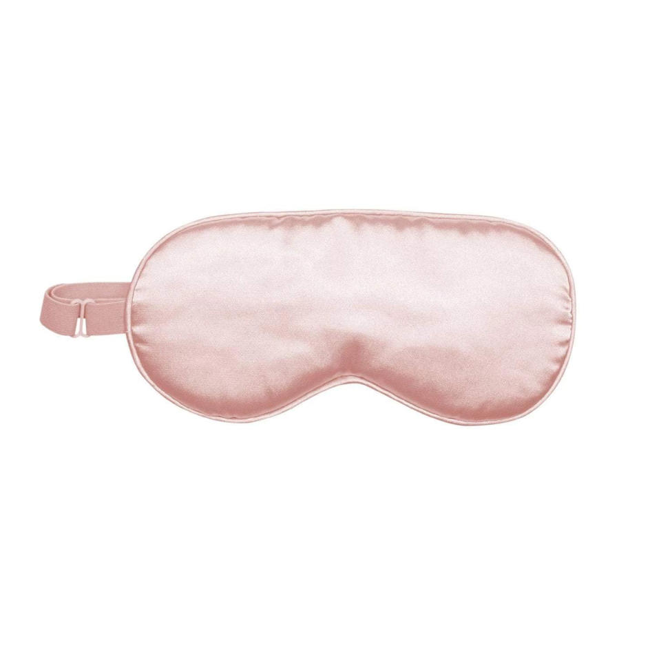 <p>Up their sleep mask game with an adjustable, cool-to-the-touch satin blindfold from Kitsch. Since satin is a little easier on skin and hair than cotton and other materials, they'll wake up with as smooth, well-rested complexion. <a href="https://www.amazon.com/Kitsch-Satin-Adjustable-Sleeping-Blindfold/dp/B07XF1LB5K?&linkCode=ll1&tag=rscheapchristmasgiftsmseaver1021-20&linkId=ab9c357a75e0b2673c89988e7c7b0a51&language=en_US&ref_=as_li_ss_tl" rel="nofollow noopener" target="_blank" data-ylk="slk:$16, amazon.com;elm:context_link;itc:0;sec:content-canvas" class="link ">$16, amazon.com</a></p>