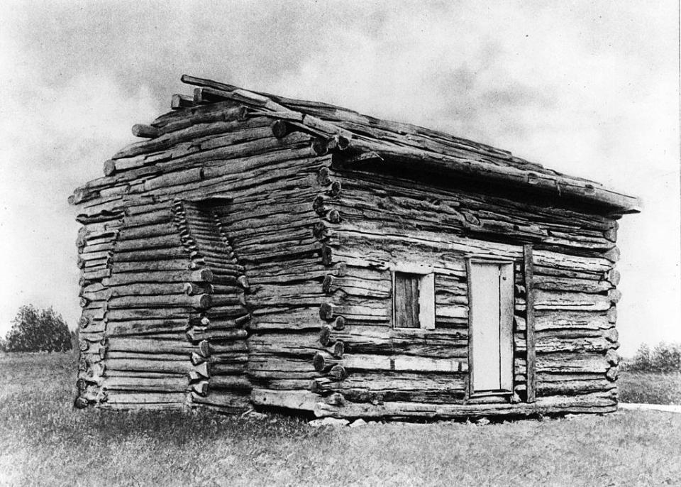 Drawing of a small log cabin