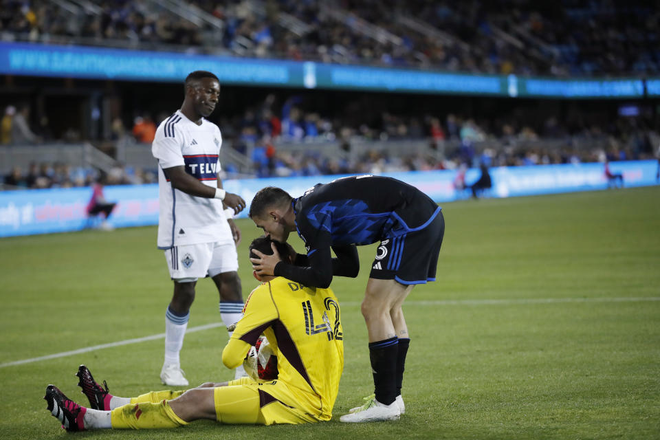 San Jose Earthquakes defender Paul Marie (3) kisses goalkeeper Daniel De Sousa Brito (42) on the head at the end of the second half of the team's soccer match against the Vancouver Whitecaps in San Jose, Calif., Saturday, March 4, 2023. (AP Photo/Josie Lepe)