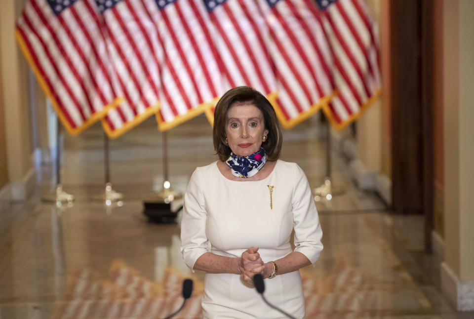 House Speaker Nancy Pelosi of Calif., walks to speak about the so-called Heroes Act, Tuesday, May 12, 2020 on Capitol Hill in Washington. Pelosi unveiled a more than $3 trillion coronavirus aid package Tuesday, providing nearly $1 trillion for states and cities, “hazard pay” for essential workers and a new round of cash payments to individuals. (Saul Loeb/Pool via AP)