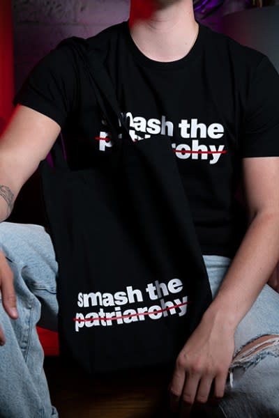 "smash the patriarchy" tote bag and t-shirt from new queer GCN merch collection.