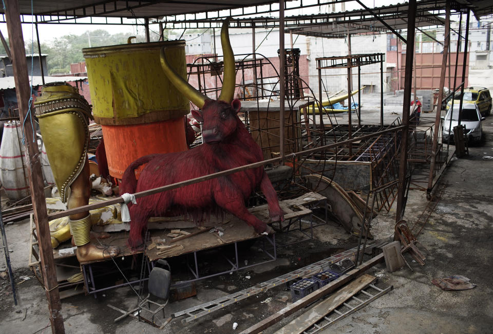 Carnival parade floats sit unfinished in the Unidos de Padre Miguel samba school workshop, in Rio de Janeiro, Brazil, Monday, Sept. 21, 2020. Rio de Janeiro on Thursday, Sept. 24, said it has delayed its annual Carnival parade, saying the global spectacle cannot go ahead in February because of Brazil’s continued vulnerability to the new coronavirus pandemic. (AP Photo/Silvia Izquierdo)