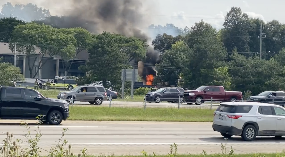 Smoke and fire are seen after a plane crashed at the Thunder Over Michigan Air Show on Aug. 13, 2023. / Credit: Daniel Maier/Twitter