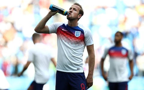 Harry Kane takes a swig - Credit: Maja Hitij - FIFA/FIFA via Getty Images