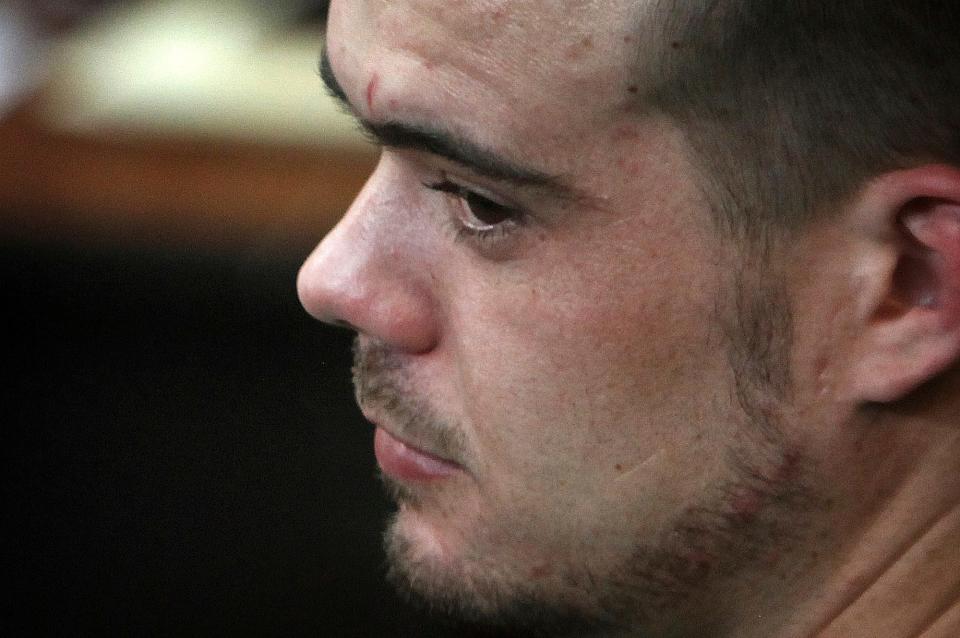 Joran van der Sloot sits in the courtroom before his sentencing at San Pedro prison in Lima, Peru.