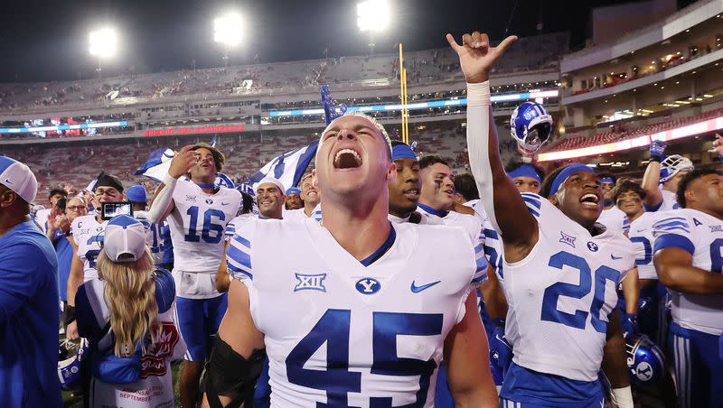 BYU Cougars defensive end Michael Daley (45) celebrates the win over the Arkansas Razorbacks at Razorback Stadium in Fayetteville on Saturday, Sept. 16, 2023. BYU won 38-31.