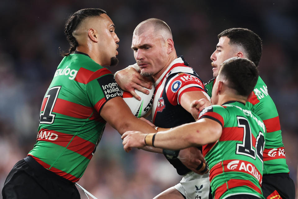 SYDNEY, AUSTRALIA - SEPTEMBER 06:  Angus Crichton of the Roosters is tackled during the round 27 NRL match between South Sydney Rabbitohs and Sydney Roosters at Accor Stadium, on September 06, 2024, in Sydney, Australia. (Photo by Matt King/Getty Images)