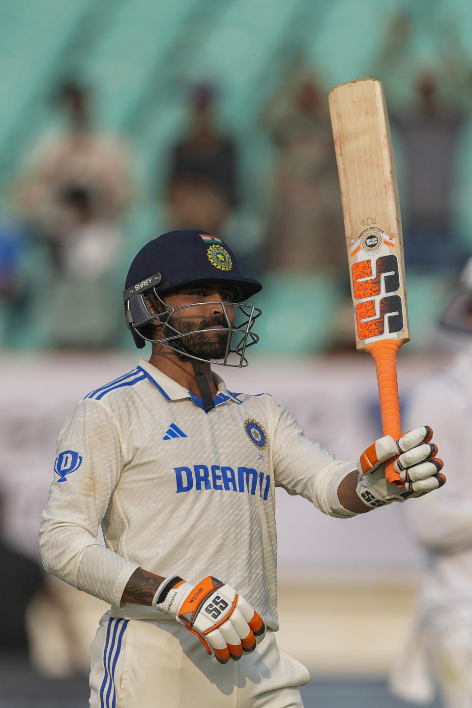 India's Ravindra Jadeja celebrates his hundred runs on the first day of the third cricket test match between India and England in Rajkot, India, Thursday, Feb. 15, 2024. (AP Photo/Ajit Solanki)