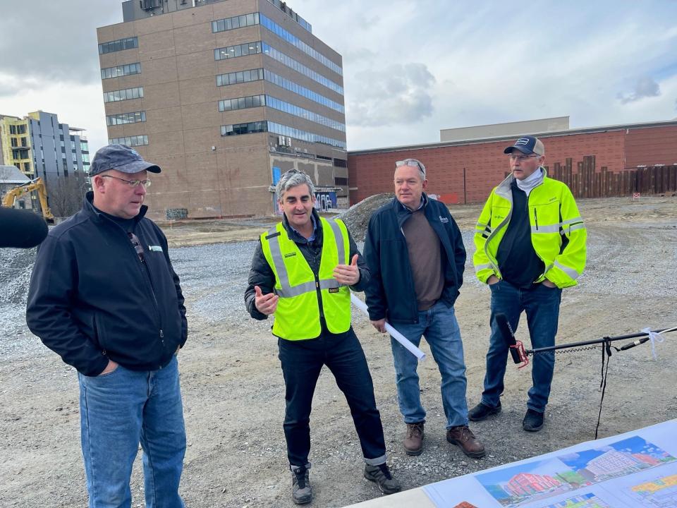 Dave Farrington, Mayor Miro Weinberger, Al Senecal and Scott Ireland (left to right) gathered at the CityPlace site on Nov. 15, 2022, to announce construction on the project has begun.