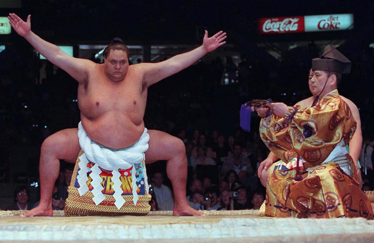 <span>Hawaiian-born sumo wrestler Taro Akebono has died of heart failure at the age of 54.</span><span>Photograph: Chuck Stoody/AP</span>