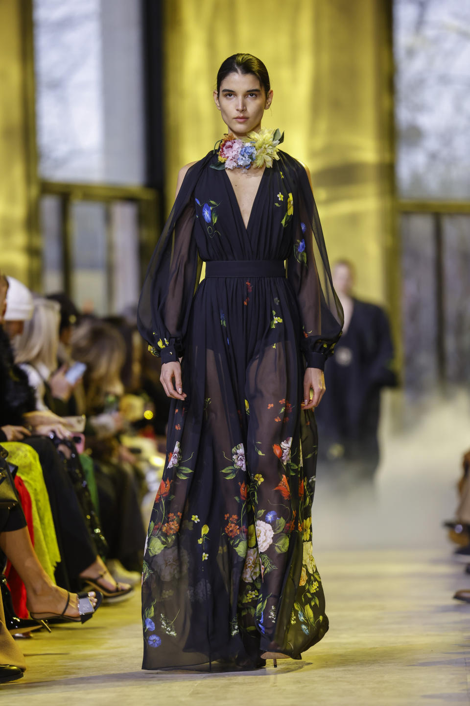 A model wears a creation as part of the Elie Saab Fall/Winter 2023-2024 ready-to-wear collection presented Saturday, March 4, 2023 in Paris. (Vianney Le Caer/Invision/AP)