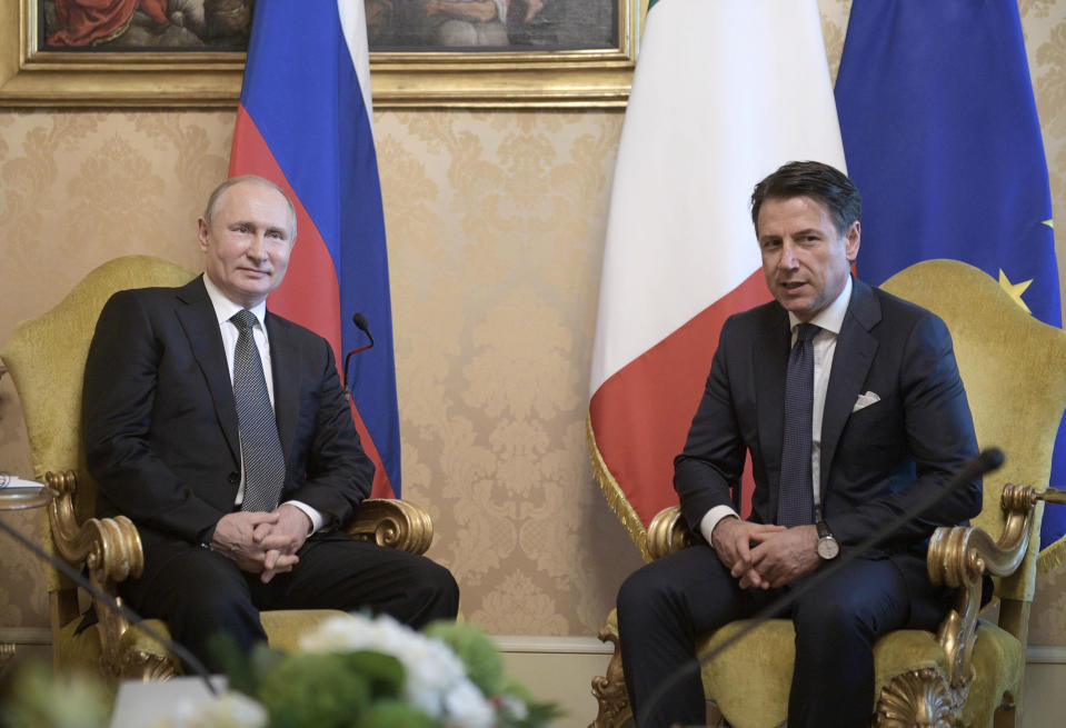 Italian Premier Giuseppe Conte, right, and Russian President Vladimir Putin pose for a photo at the Chigi palace in Rome, Thursday, July 4, 2019. Putin emphasized historically strong ties with Italy during a one-day visit to Rome that included a meeting with Pope Francis. (Alexei Druzhinin, Sputnik, Kremlin Pool Photo via AP)