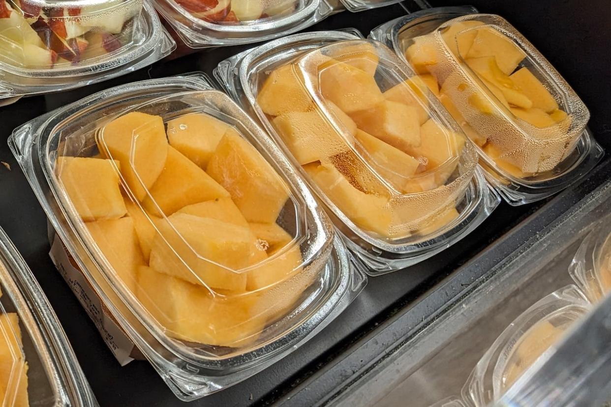 Cut cantaloupe is pictured at a grocery store in Philadelphia on Sunday. On Thursday, U.S. and Canadian officials said more people had died in a salmonella outbreak linked to tainted cantaloupe. (Jonathan Poet/The Associated Press - image credit)