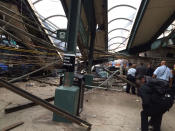 <p>Structural damage is seen at the train station in Hoboken, N.J., after a New Jersey Transit commuter train crashed into the station during the morning rush hour, Thursday, Sept. 29, 2016. (William Sun via AP) </p>