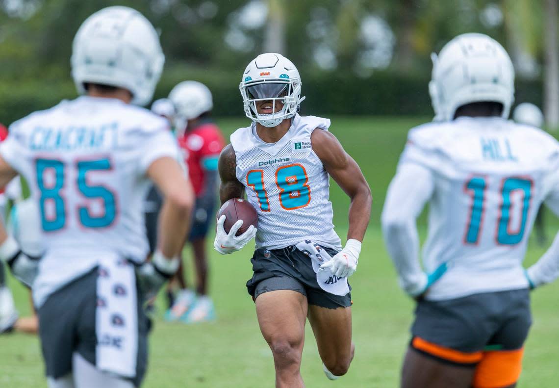 Miami Dolphins wide receiver Erik Ezukanma (18) runs drills during a team practice session at the Baptist Health Training Complex on Wednesday, Oct. 19, 2022, in Miami Gardens, Fla.